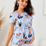 Maternidad top peplum con estampado floral con libelula