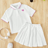 Camisa De Polo Con Bordado De Corazon Y Falda Plisada A Juego Para Nina Adolescente