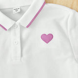 Camisa De Polo Con Bordado De Corazon Y Falda Plisada A Juego Para Nina Adolescente