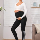 Maternidad leggings de rayas laterales