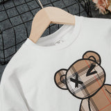 Chica preadolescente Pullover con estampado de oso & Falda fruncido de cuadros