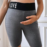 Leggings De Embarazo Con Bloques De Color Y Letras Impresas