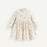 Cozy Cub Bebe nina Vestido smock con estampado de cereza de cuello alto