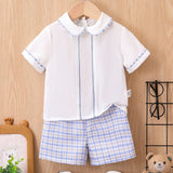 Conjunto de top y shorts de manga corta con diseno artistico casual y elegante de estilo masculino de moda para bebe nino