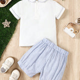 Conjunto de top de manga corta con cuello de muneca y pantalones cortos a rayas para bebe nino de primavera / verano