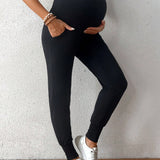 Pantalones simples de maternidad de unicolor para uso diario