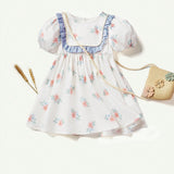 Cozy Cub Vestido de manga corta para bebe con dobladillo tipo burbuja y volante con estampado de flores y escote cuadrado en contraste