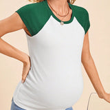 Camiseta de maternidad joven casual de cuello redondo de manga corta, ajuste regular, colorblock delgada para el embarazo