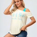 Camiseta de maternidad casual para joven futura mama con cuello asimetrico y manga corta con estampados florales