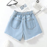 Shorts de mezclilla para ninas preadolescentes con corte de cintura asimetrico y cortes desgastados con dobladillo deshilachado para verano