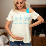 Camiseta de maternidad casual para joven futura mama con cuello asimetrico y manga corta con estampados florales